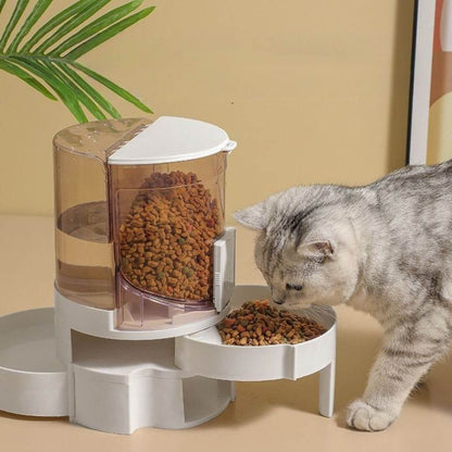 distributeur de croquettes pour chat rose